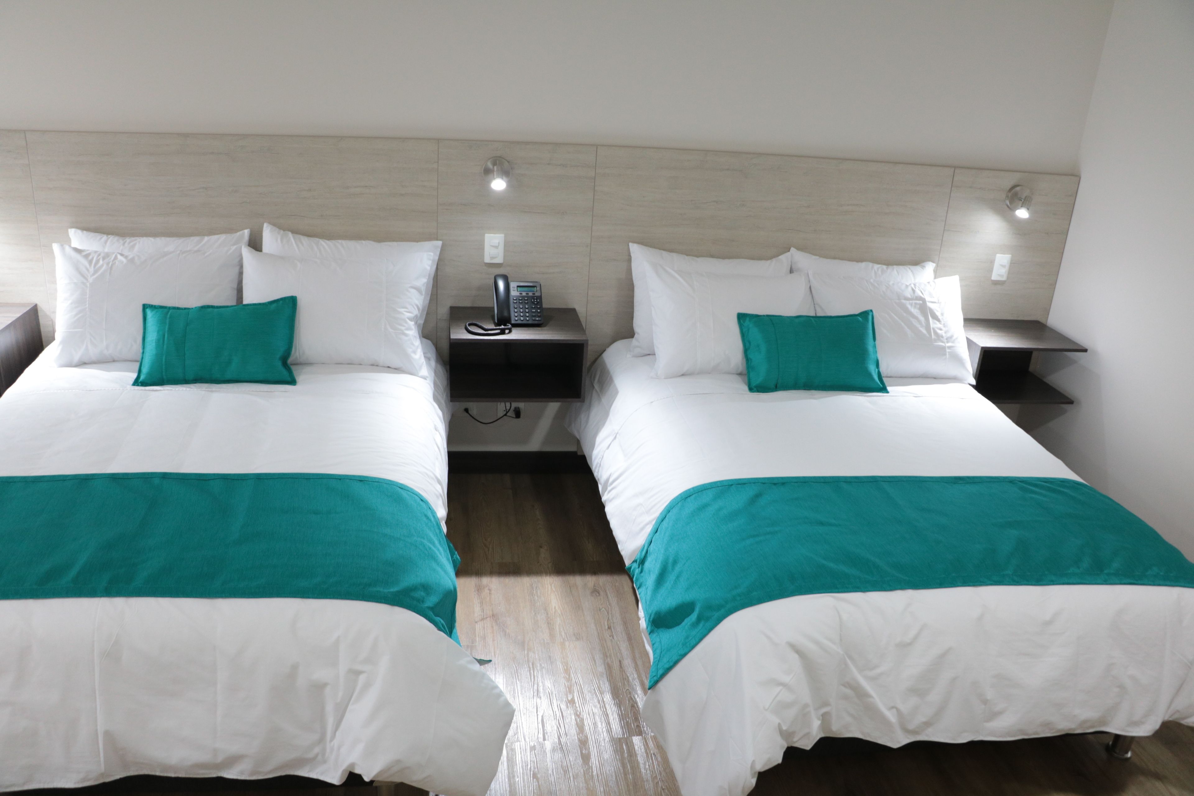 deluxe twin room, multiple beds, city view | premium bedding, minibar, in-room safe, desk
