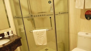 A bathroom with a glass-enclosed shower, a white toilet, and a marble sink. - GreenTree Inn BeiJing Haidian Shijingshan N Univ of Tech Htl (Beijing)