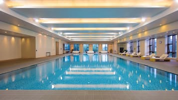 Indoor pool, pool loungers, lifeguards on site