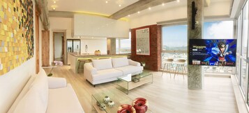 Grand Apartment, 2 Bedrooms, River View | Living area | 50-inch Smart TV with digital channels, TV, Netflix