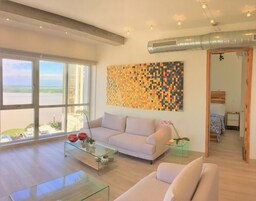 Grand Apartment, 2 Bedrooms, River View | Living area | 50-inch Smart TV with digital channels, TV, Netflix