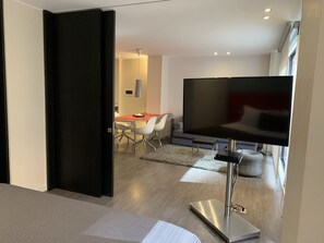 49-inch flat-screen TV with cable channels, TV