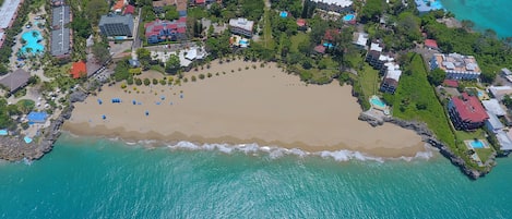 On the beach, white sand