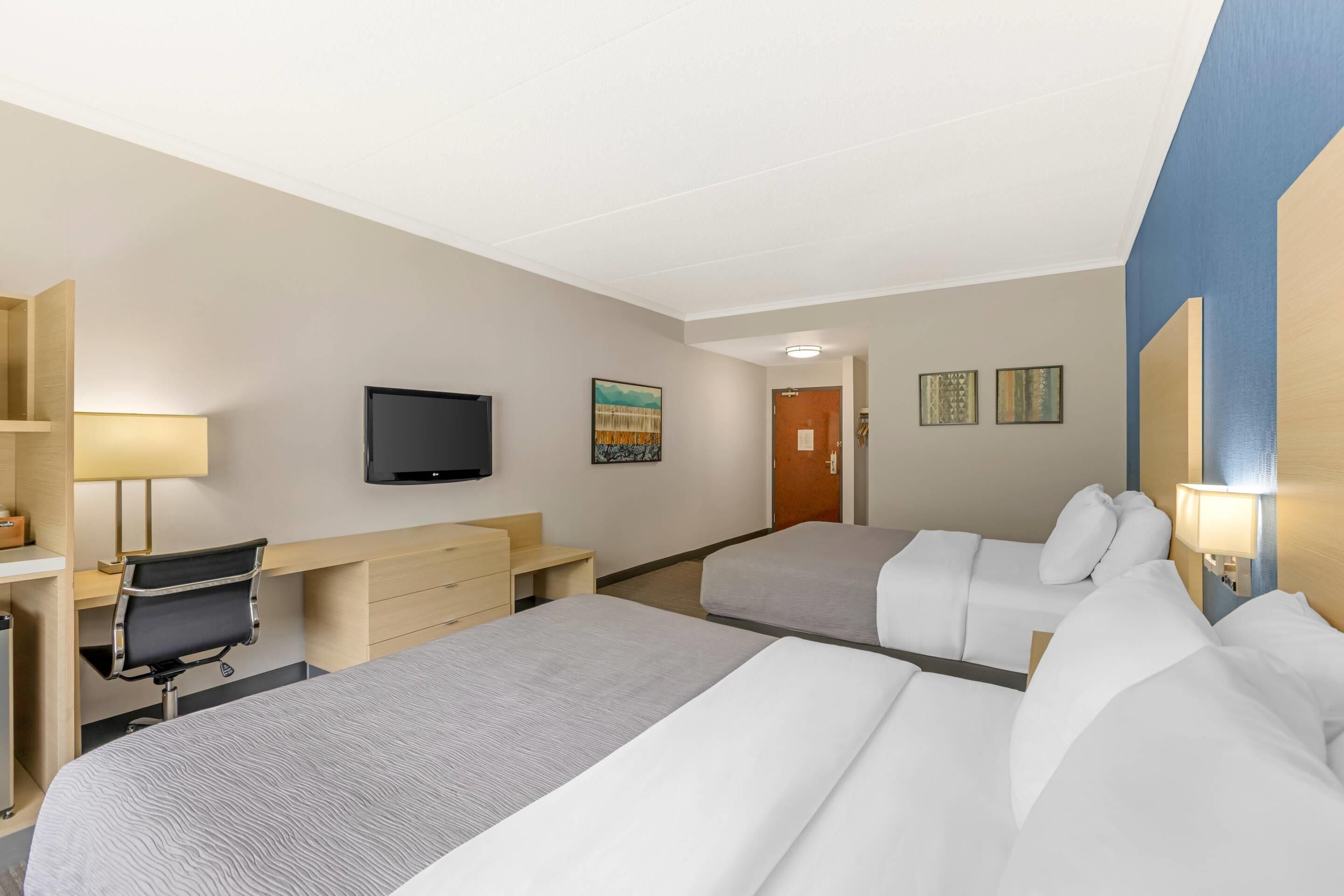 hypo-allergenic bedding, desk, blackout curtains, iron/ironing board