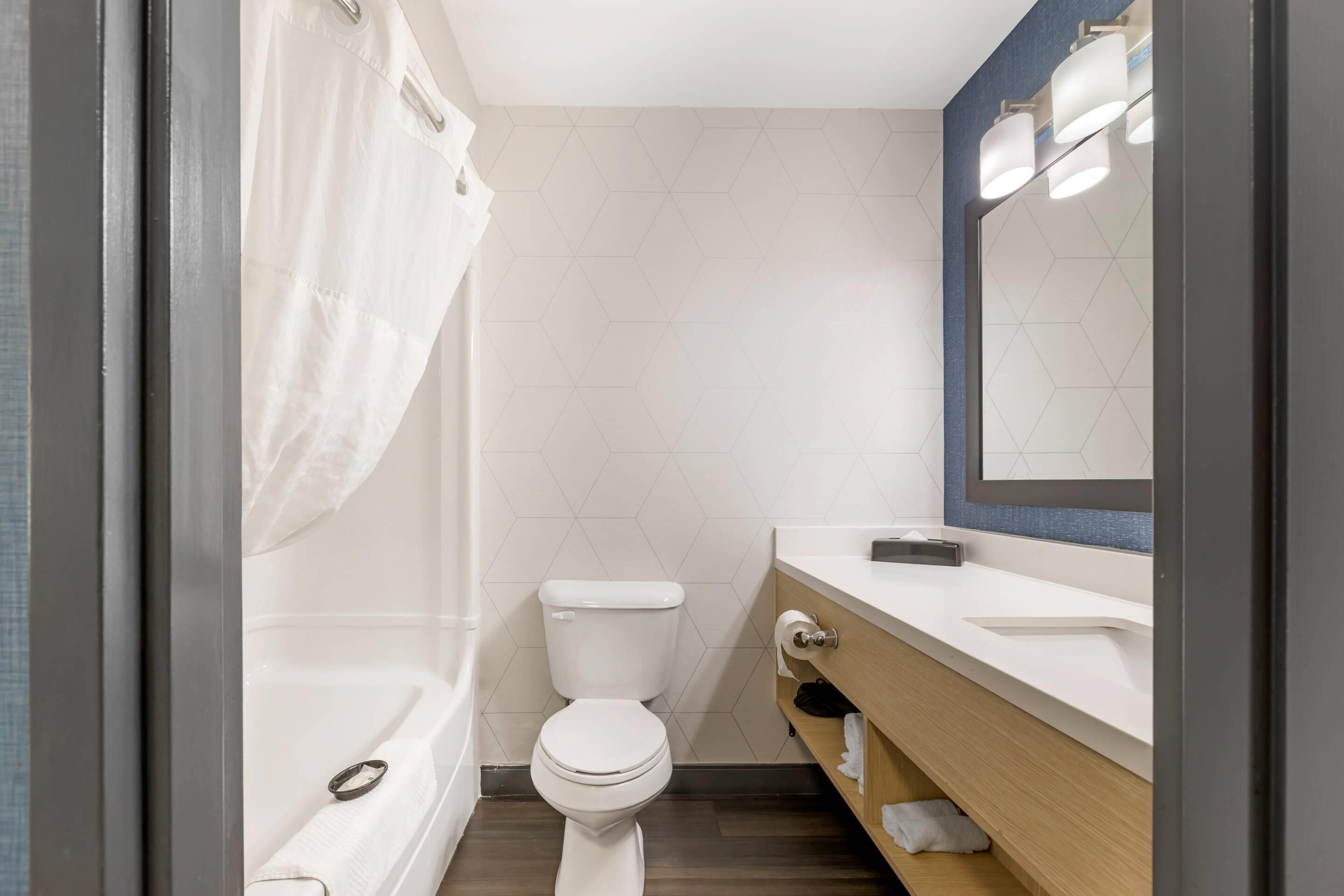 hypo-allergenic bedding, desk, blackout curtains, iron/ironing board