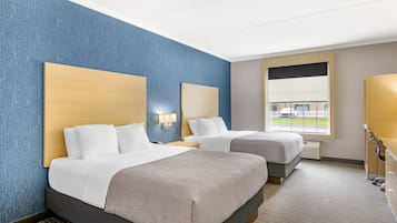 Hypo-allergenic bedding, desk, blackout drapes, iron/ironing board