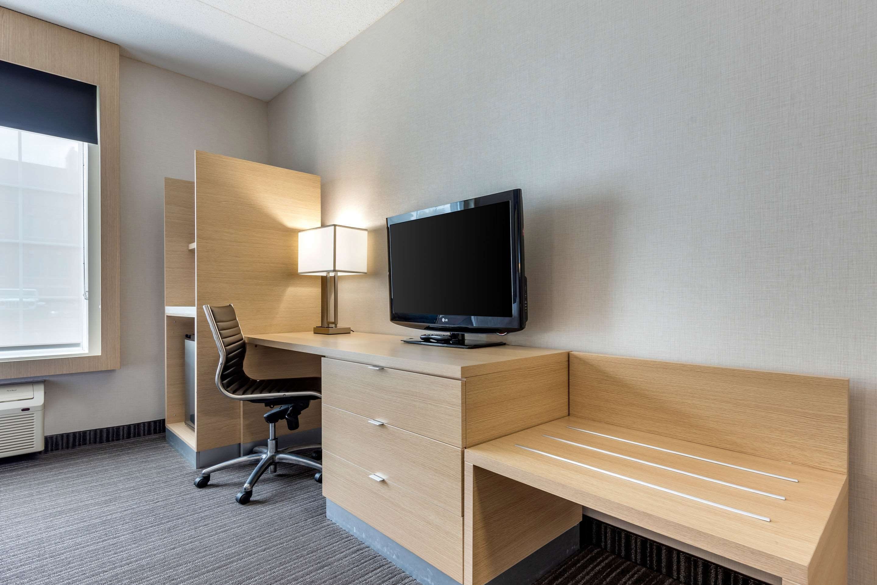 hypo-allergenic bedding, desk, blackout curtains, iron/ironing board