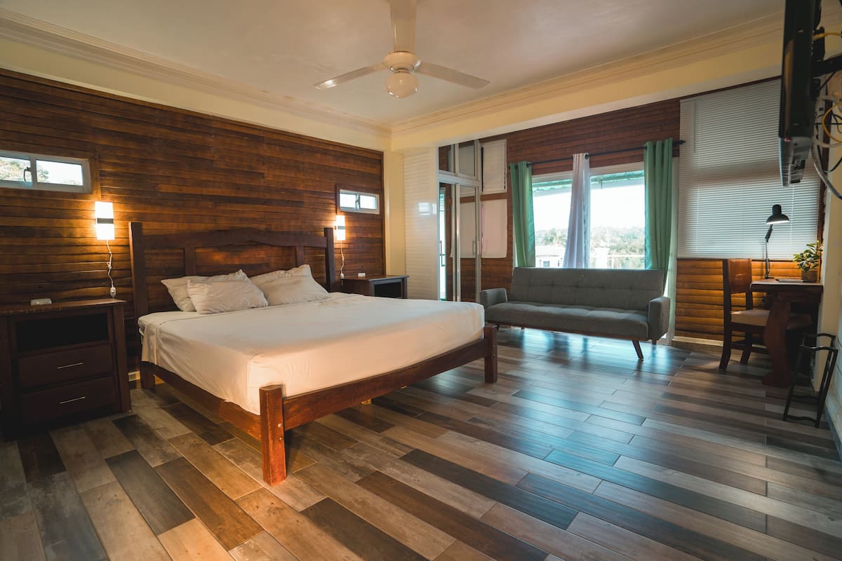 superior room, 1 king bed | in-room safe, desk, laptop workspace, blackout curtains