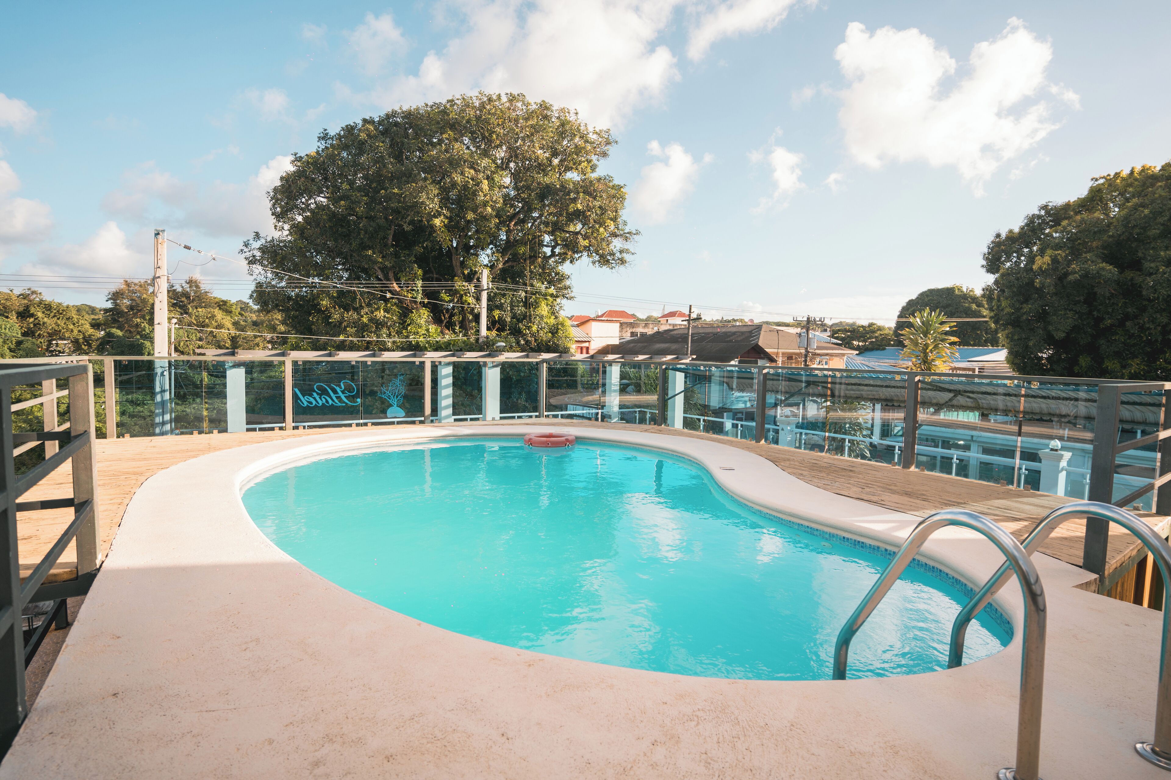 outdoor pool, pool umbrellas, pool loungers