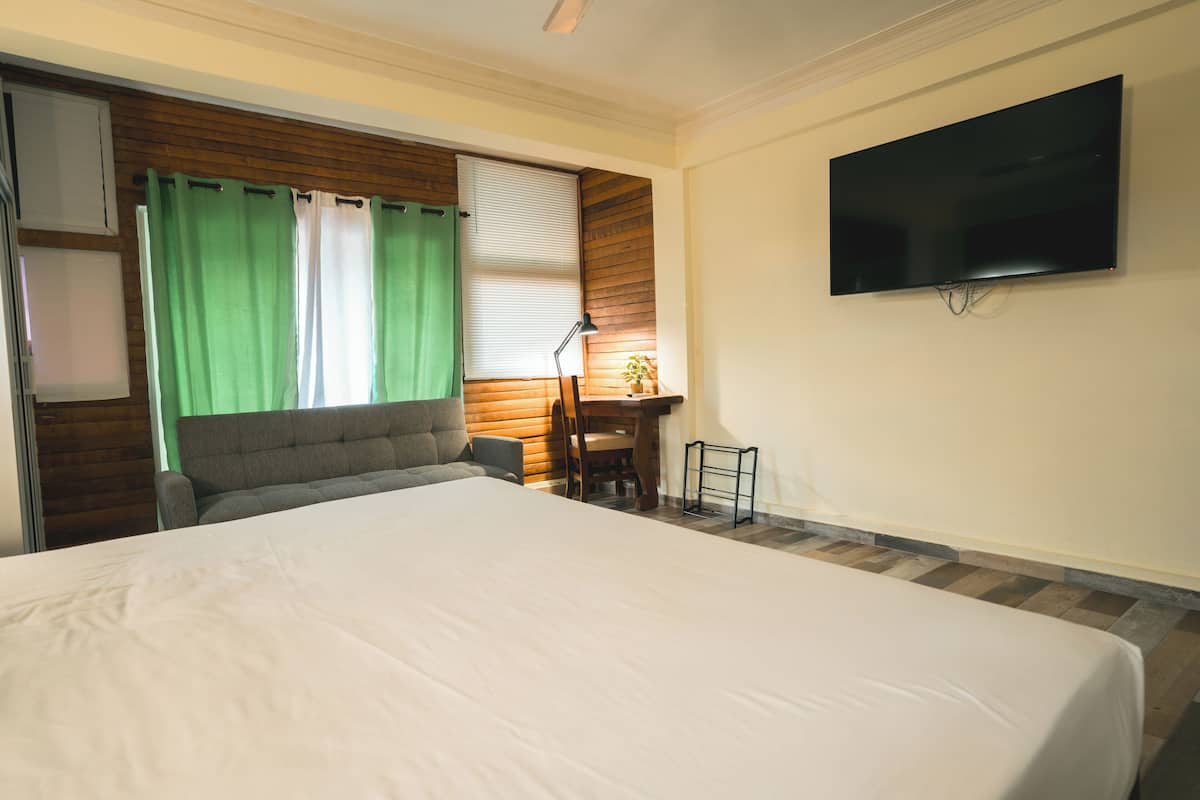 superior room, 1 king bed | in-room safe, desk, laptop workspace, blackout curtains