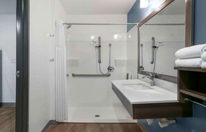 Combined shower/tub, hair dryer, towels, soap