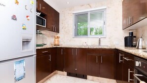Exclusive Condo, 3 Bedrooms, Private Pool, Partial Ocean View | Private kitchen - BOSQUE DE LOS ALUXES INDO BY PLAYA PARADISE (Playa del Carmen)