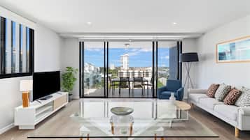 Two Bedroom Superior Apartment | Living area | 48-inch flat-screen TV with digital channels, TV, DVD player