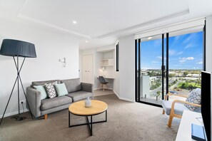 48-inch flat-screen TV with digital channels, TV, DVD player - Direct Collective - Seabreeze Mooloolaba (Mooloolaba)