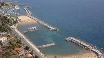 Beach nearby, sun loungers