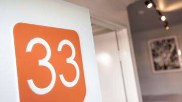 A close-up of a sign with the number 33.