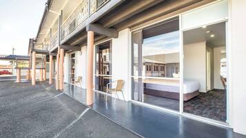 Experience the hotel's modern design with a spacious outdoor area and a balcony overlooking the street.