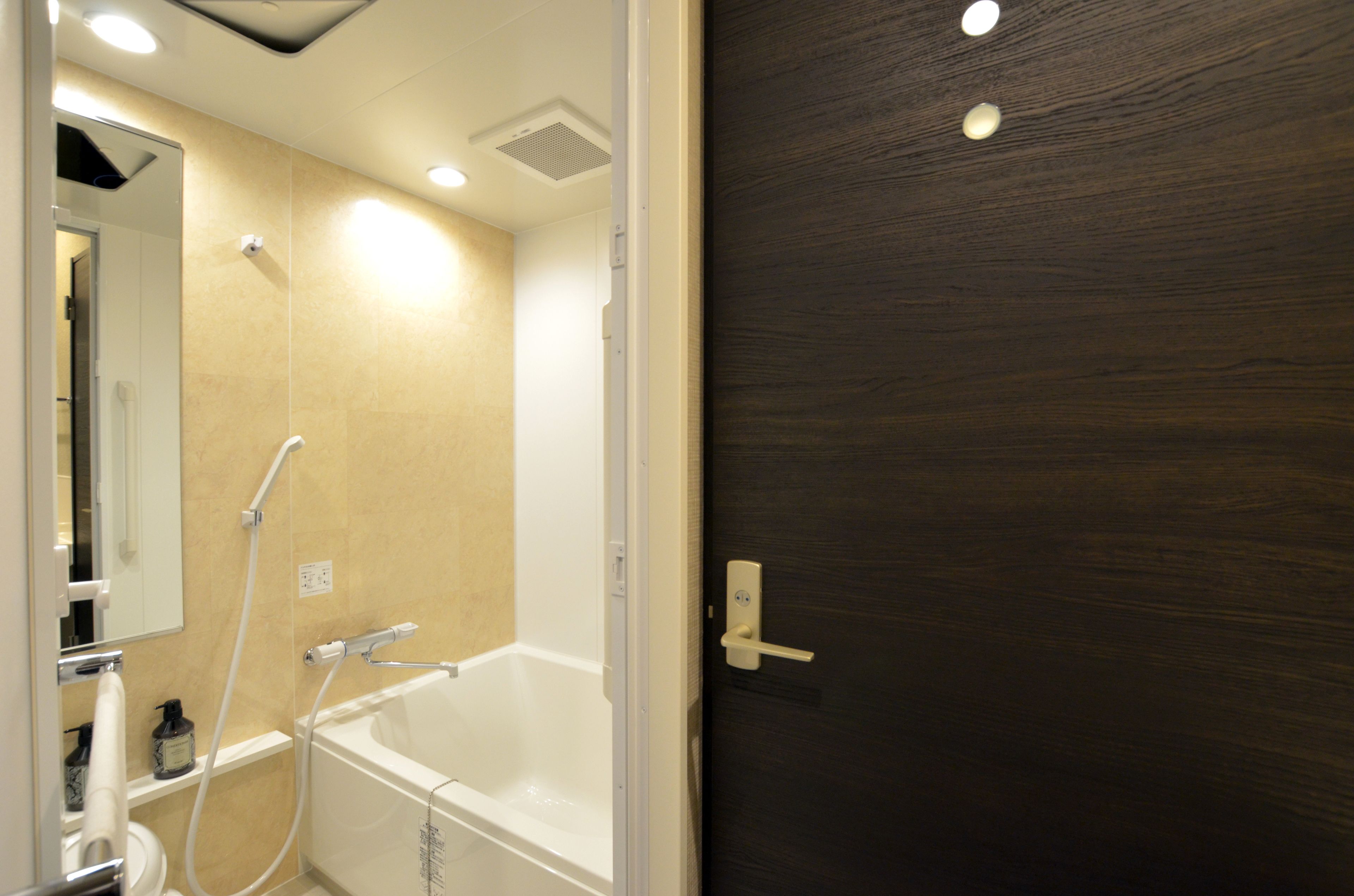 separate bathtub and shower, free toiletries, hair dryer, slippers