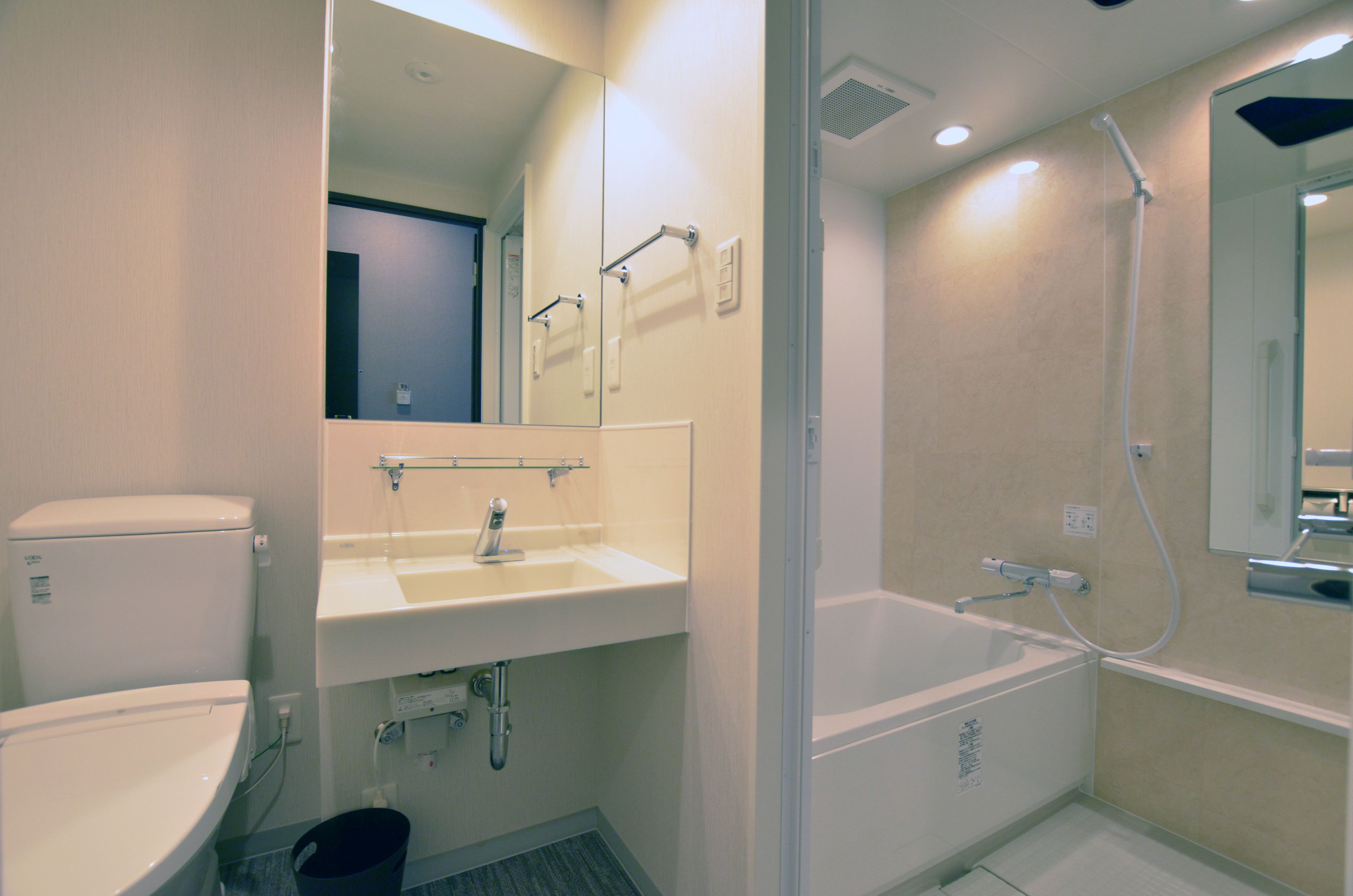 separate bathtub and shower, free toiletries, hair dryer, slippers