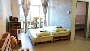 Two Bedroom Apartment | Living area | 32-inch Smart TV with cable channels, TV