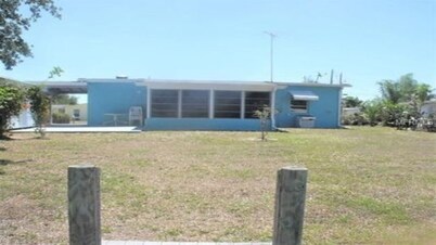Completely remodeled beautiful waterfront property on canal with dock