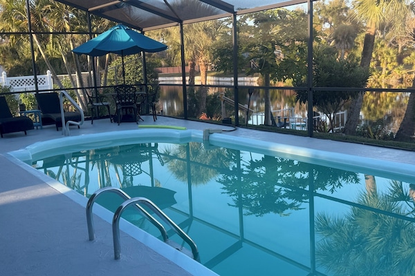 Large Salt Water Heated Pool with plenty comfortable sitting chairs