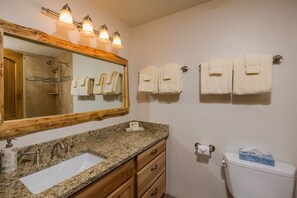 Combined shower/bathtub, hair dryer, bathrobes, towels