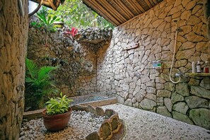 Royal Stone House | Bathroom | Free toiletries, slippers, towels, soap - RAJAKLANA Resort, Villa And Spa (Bangunjiwo)