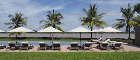 Outdoor pool, pool umbrellas, sun loungers