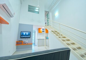Suite | Living room | Flat-screen TV, DVD player - Yume Home at The Ceo Duplex Suite (George Town)