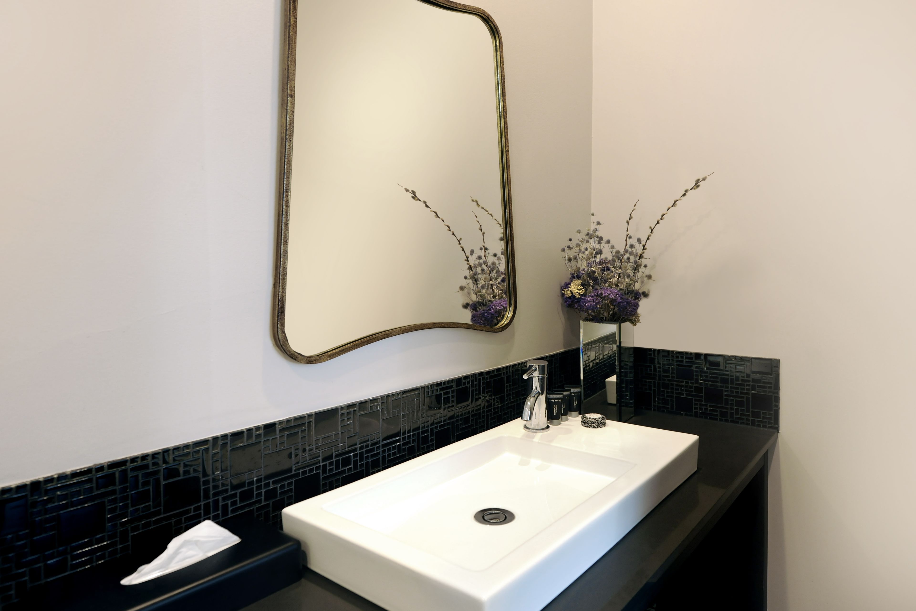 shower, designer toiletries, hair dryer, towels