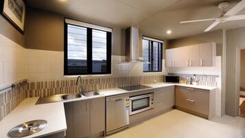 Three Bedroom Apartment | Private kitchen | Fridge, coffee/tea maker, electric kettle