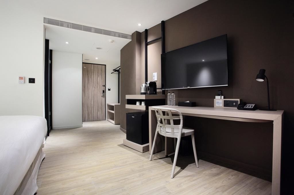 premier double room | living area | lcd tv