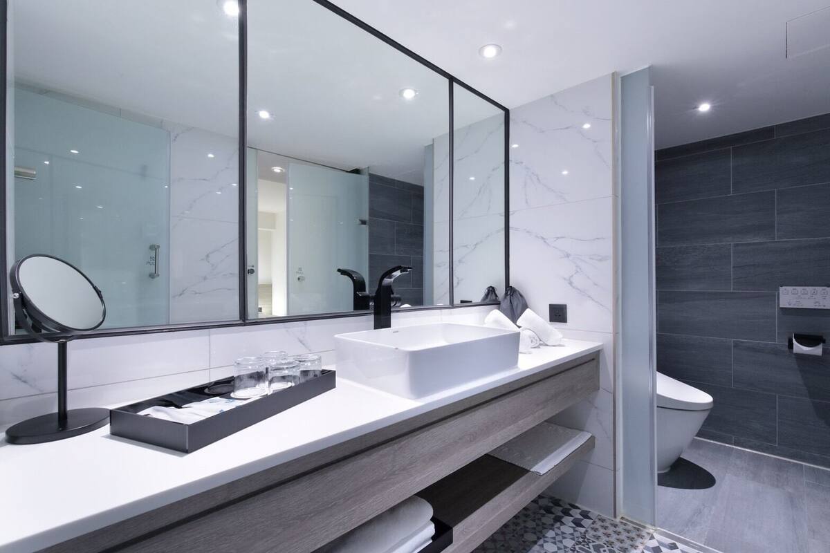 family room | bathroom | shower, hair dryer, slippers, electronic bidet