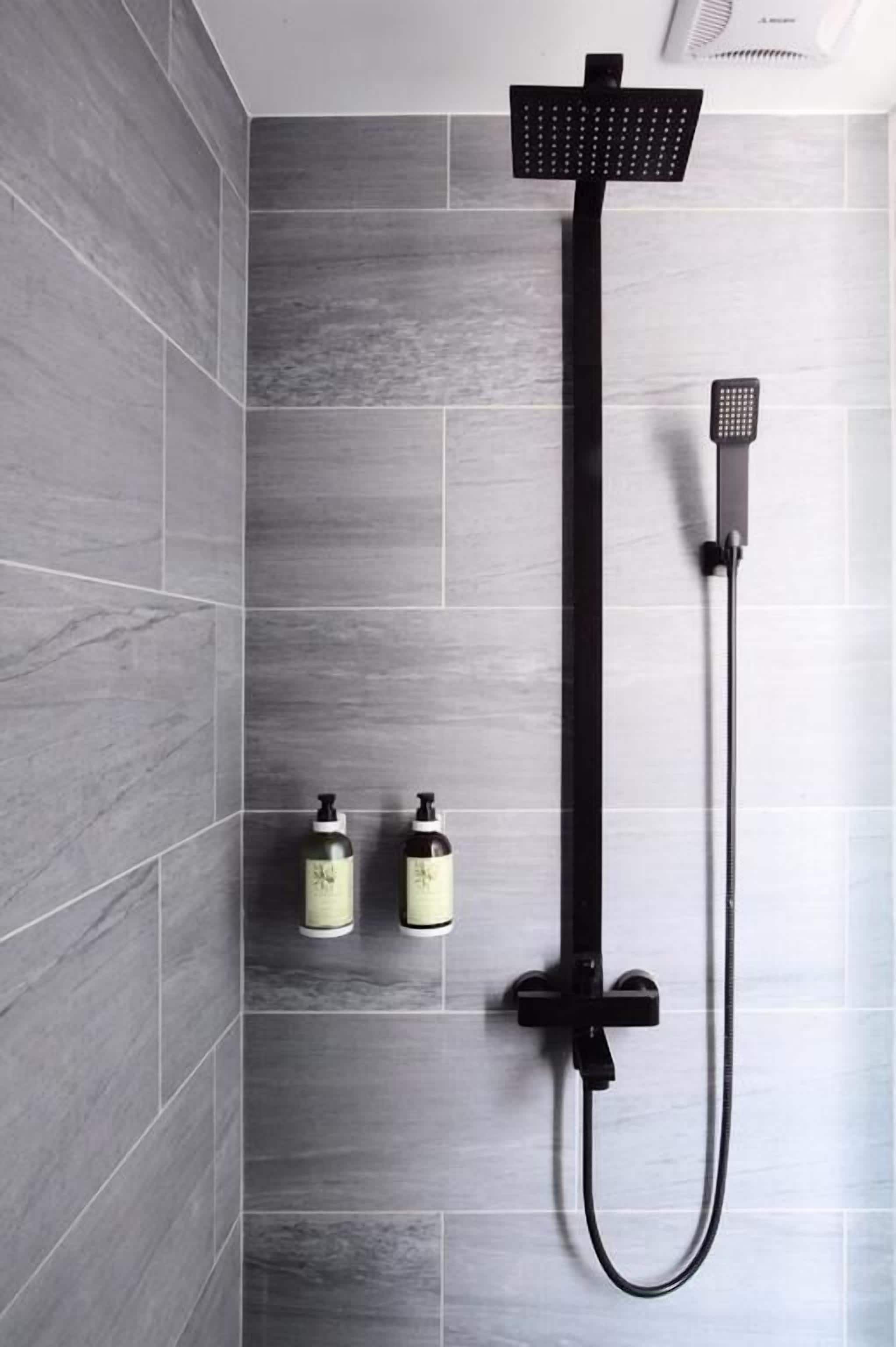 shower, hair dryer, slippers, electronic bidet