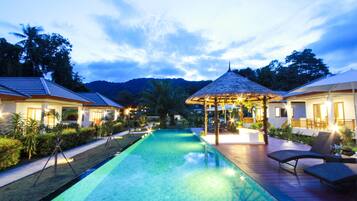 Outdoor pool, open 8:00 AM to 8:00 PM, pool umbrellas, pool loungers