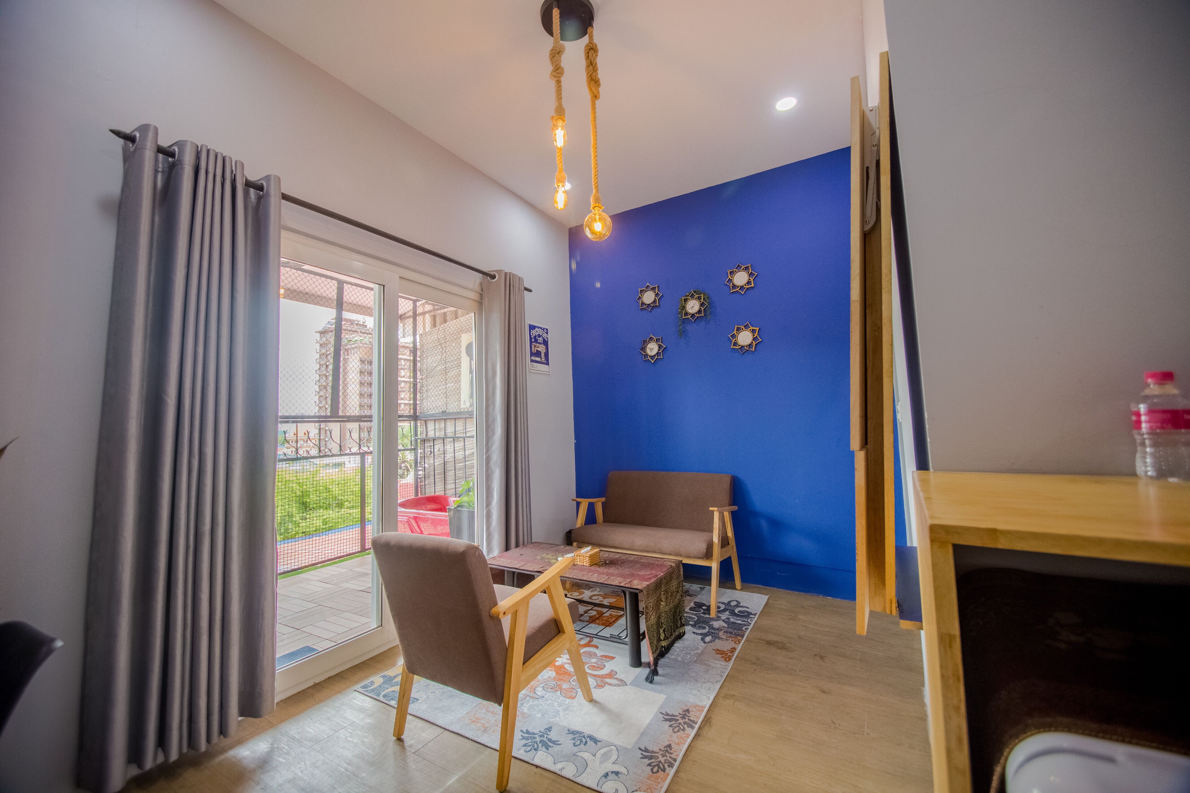 Deluxe Double With Balcony | Living area | LCD TV
