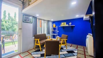 Family Duplex Room with Balcony | Living area | LCD TV