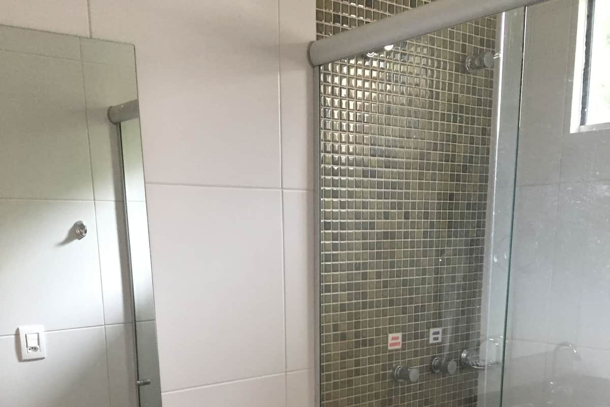 shower, towels, soap, toilet paper