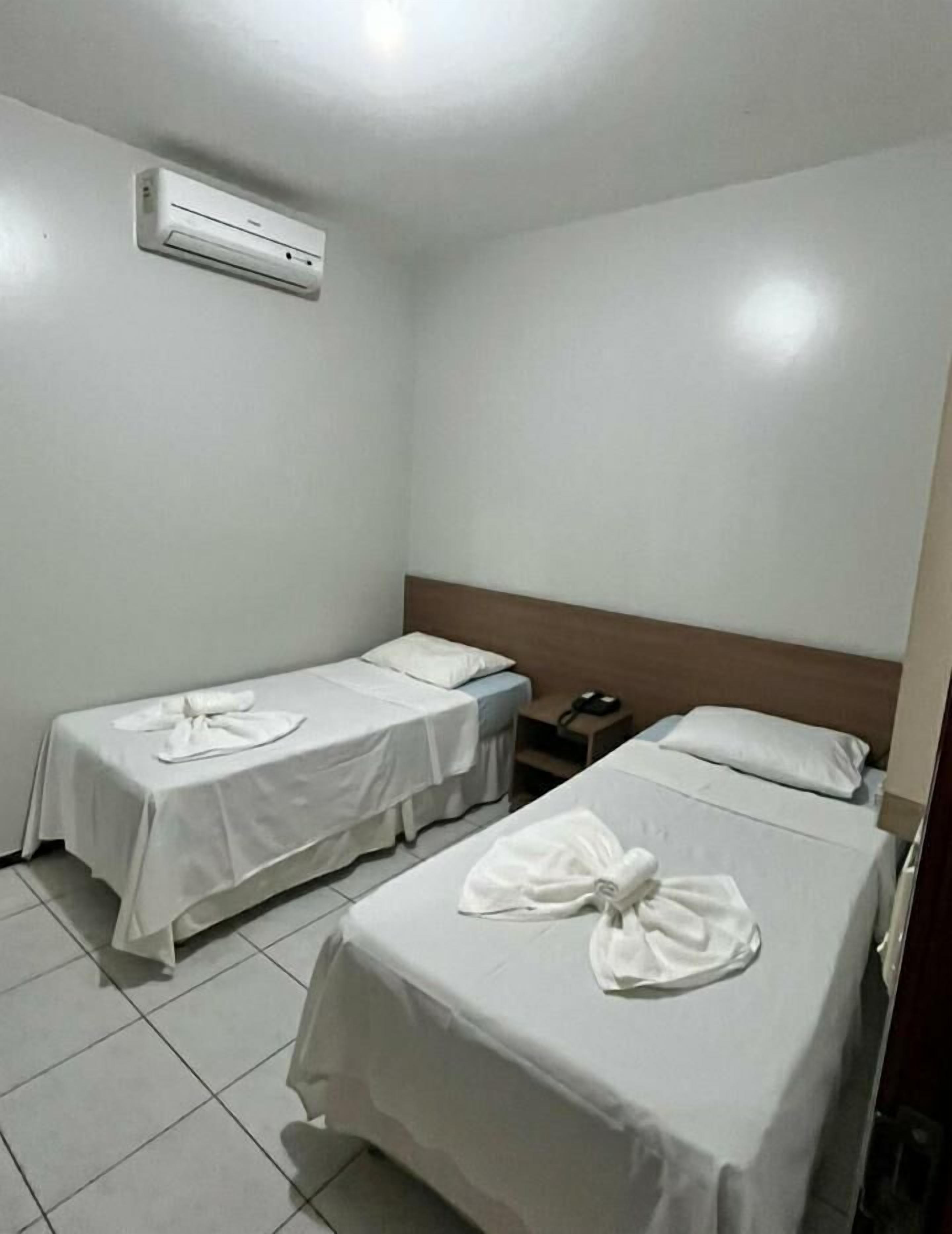 Basic Twin Room, 2 Twin Beds | Minibar, desk, blackout drapes, free WiFi