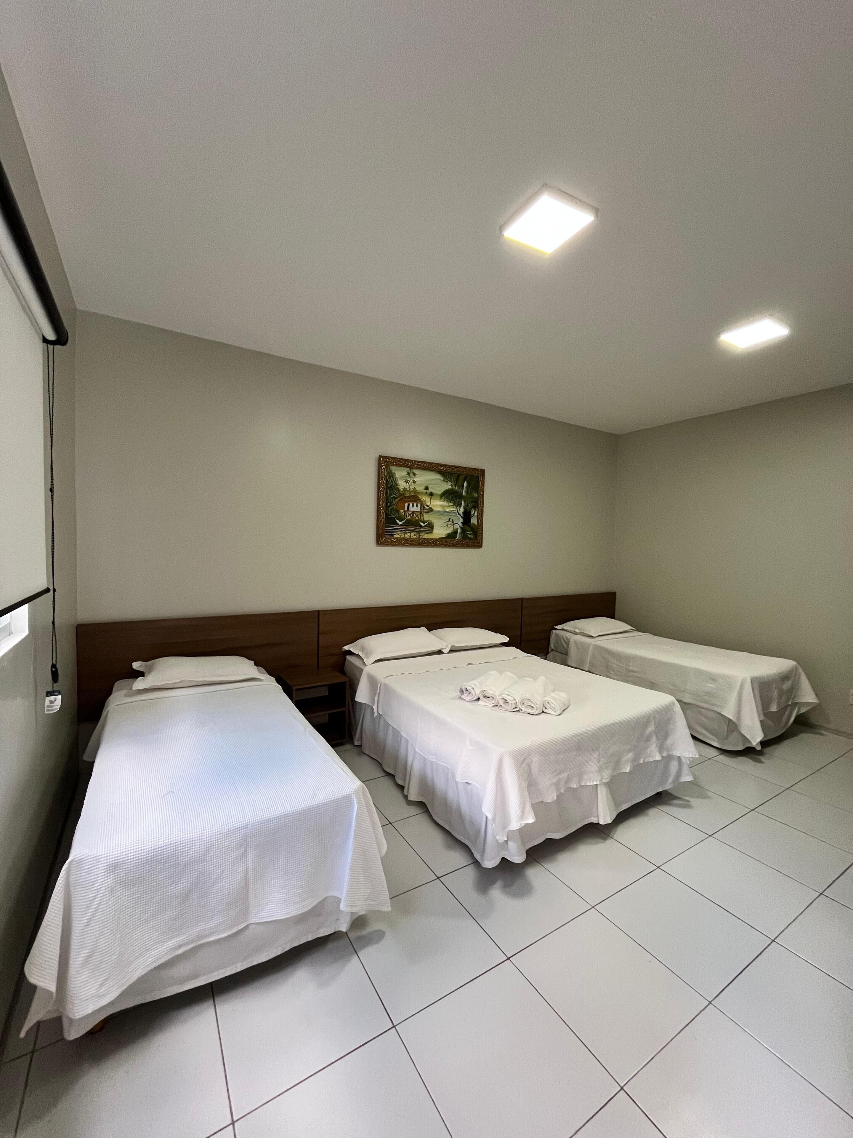 Basic Quadruple Room | Minibar, desk, blackout drapes, free WiFi