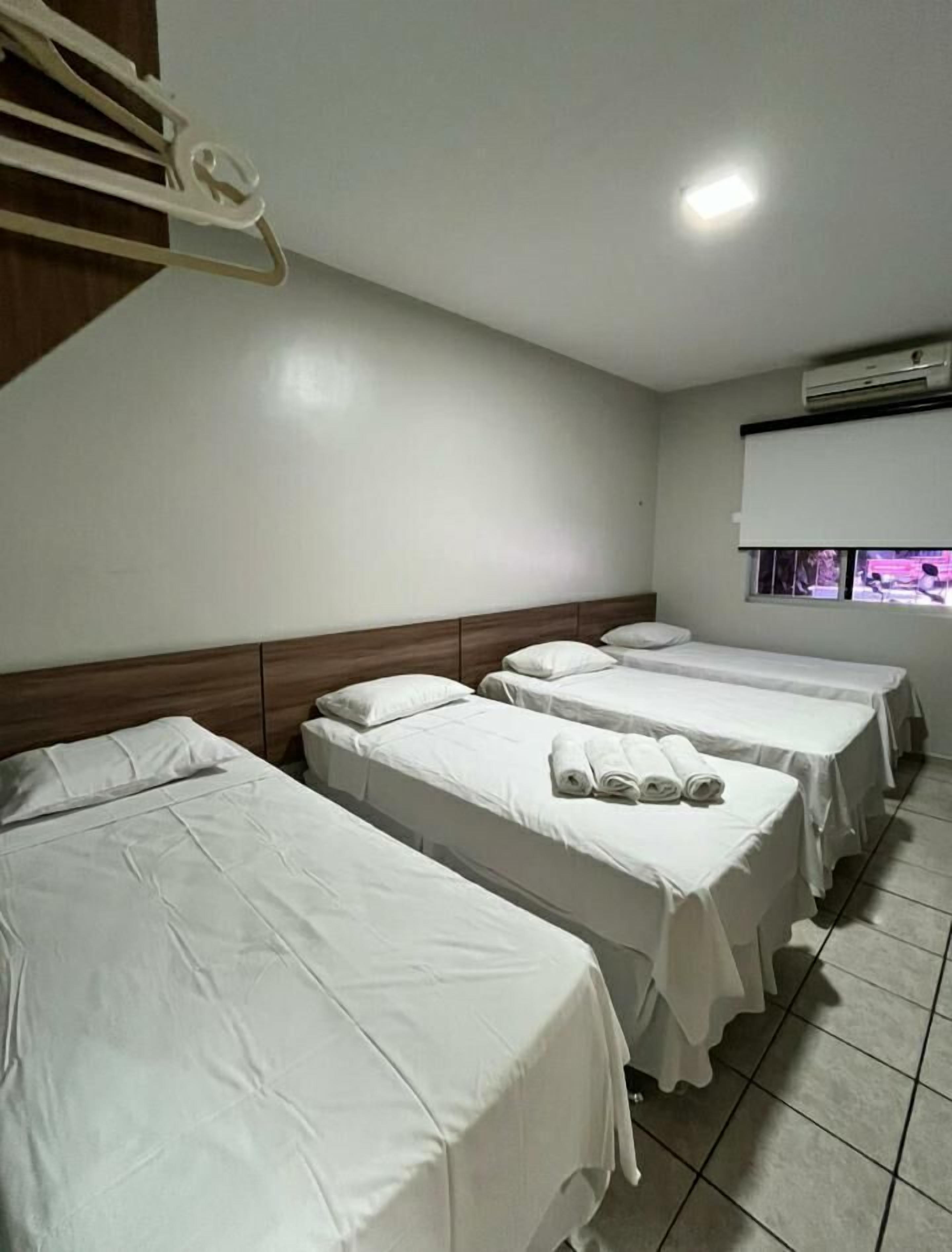 Basic Quadruple Room | Minibar, desk, blackout drapes, free WiFi