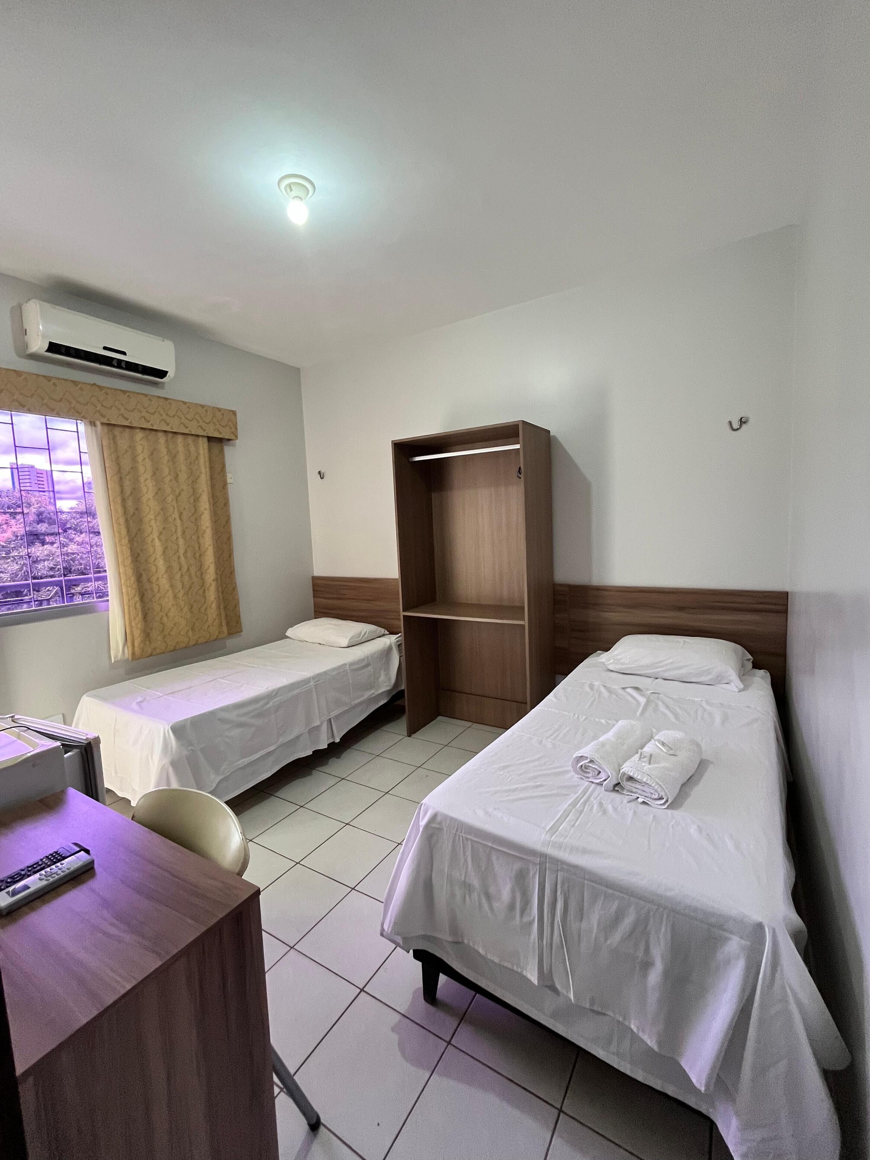 Basic Twin Room, 2 Twin Beds | Minibar, desk, blackout drapes, free WiFi