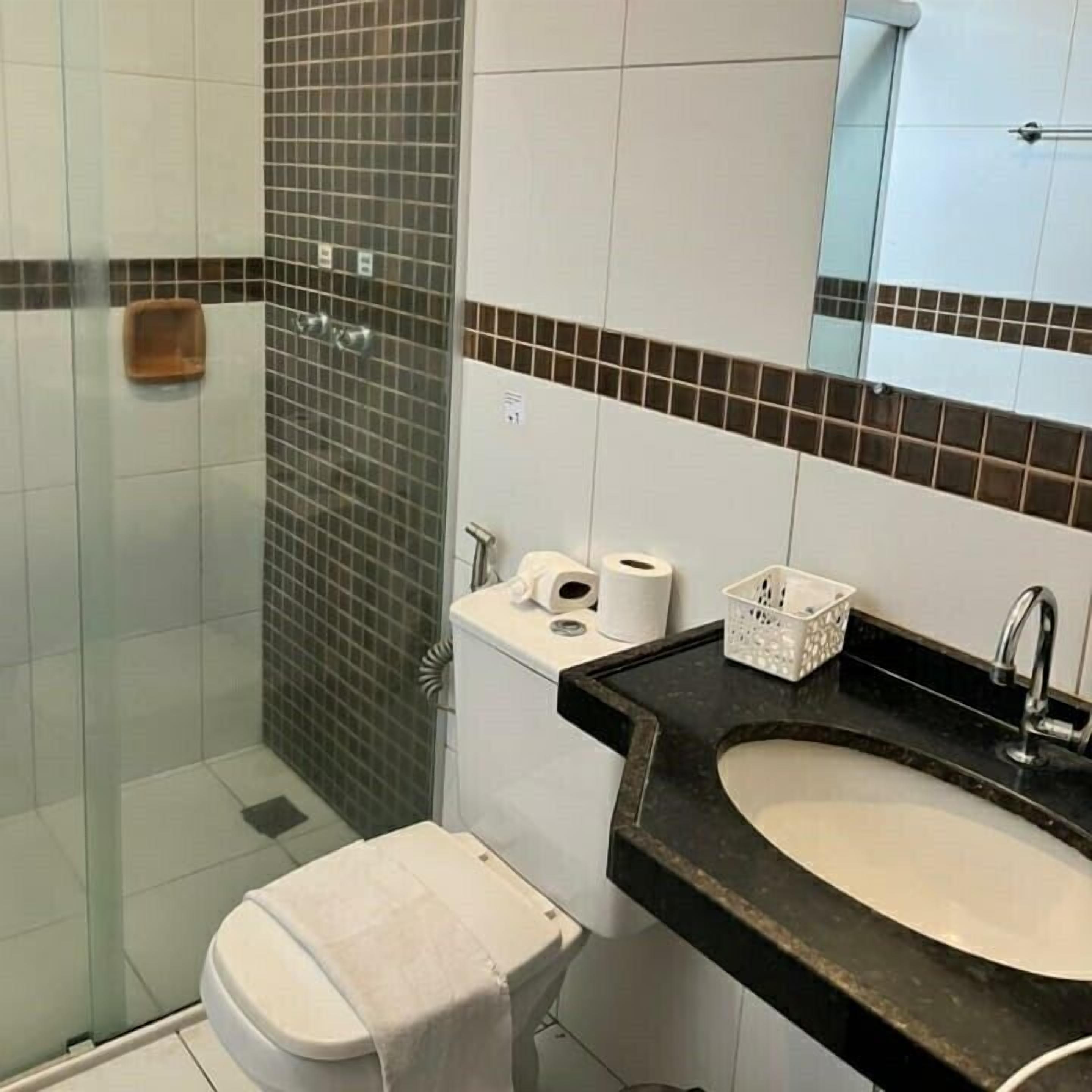 Basic Double Room | Bathroom | Shower, towels, soap, toilet paper