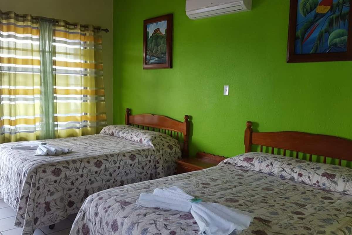 quadruple room, ocean view, beachfront | in-room safe, desk, iron/ironing board, free wifi