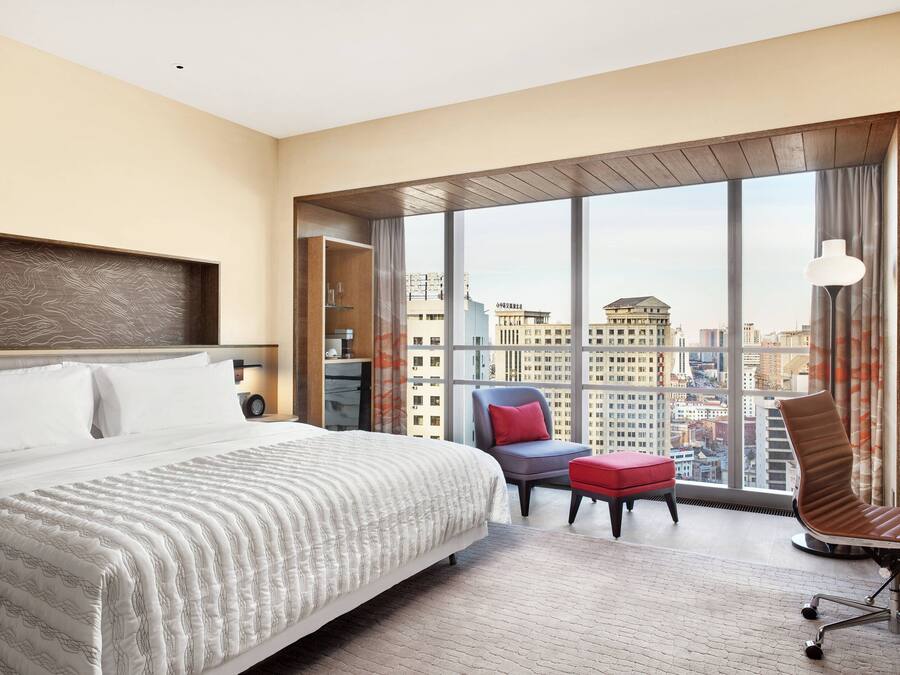 Premium bedding, free minibar items, in-room safe, iron/ironing board