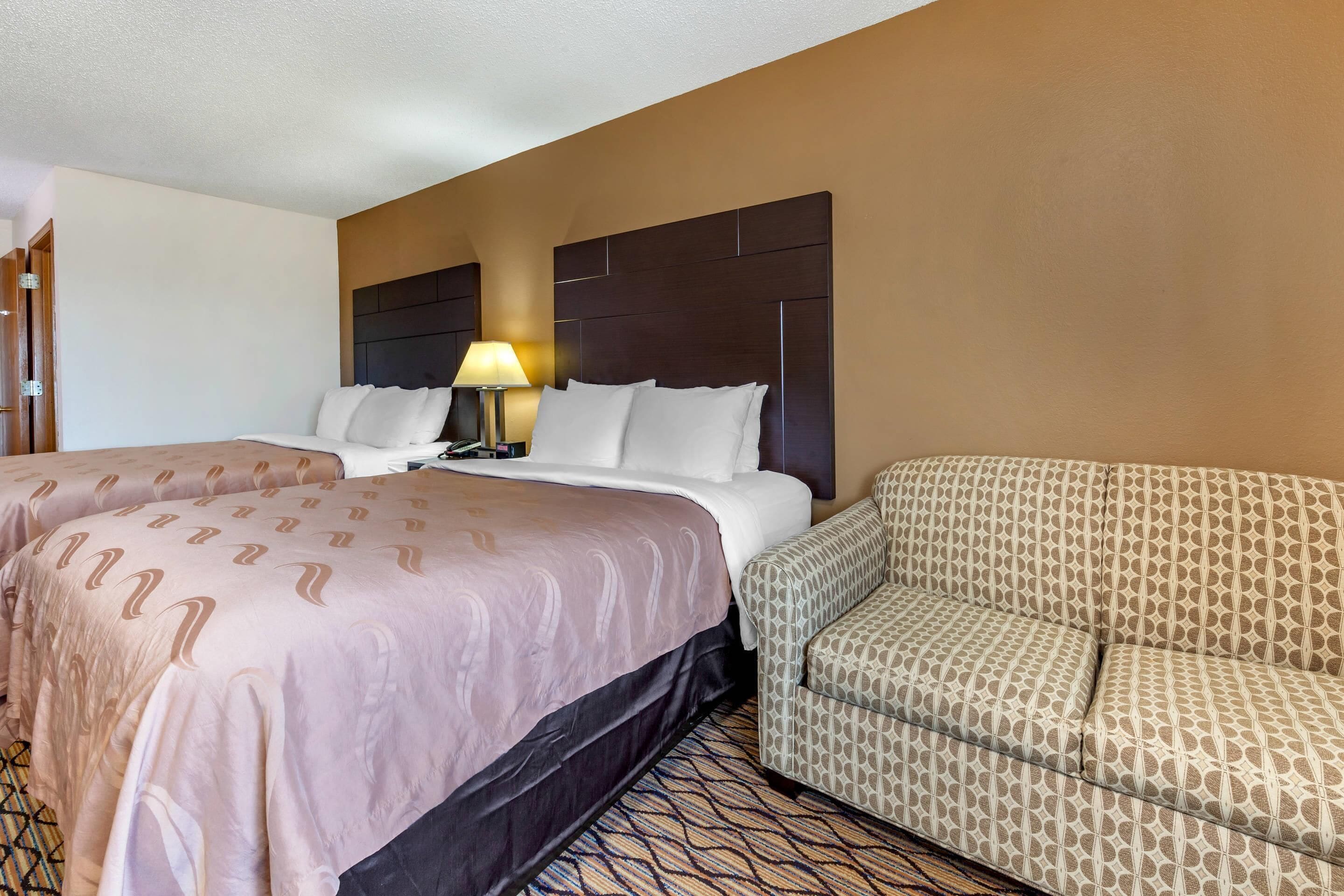 premium bedding, desk, laptop workspace, blackout curtains