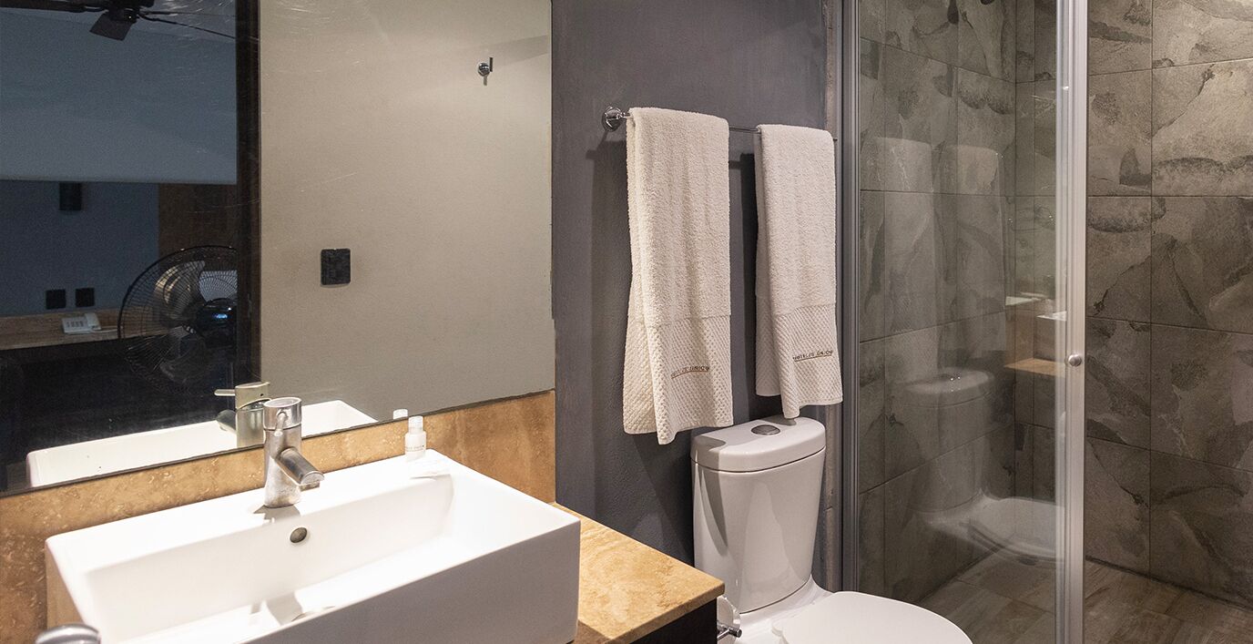 double room, 2 double beds | bathroom | shower, free toiletries, towels