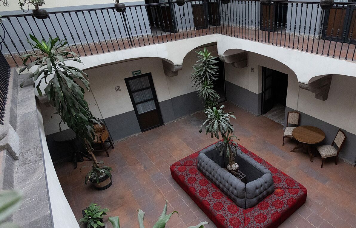 Double Room, 2 Double Beds | Living area | Flat-screen TV