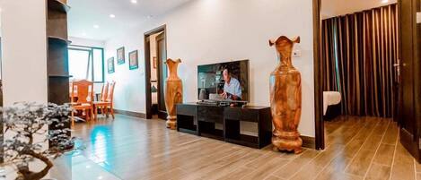 Luxury-Apartment | Wohnbereich | Flachbildfernseher